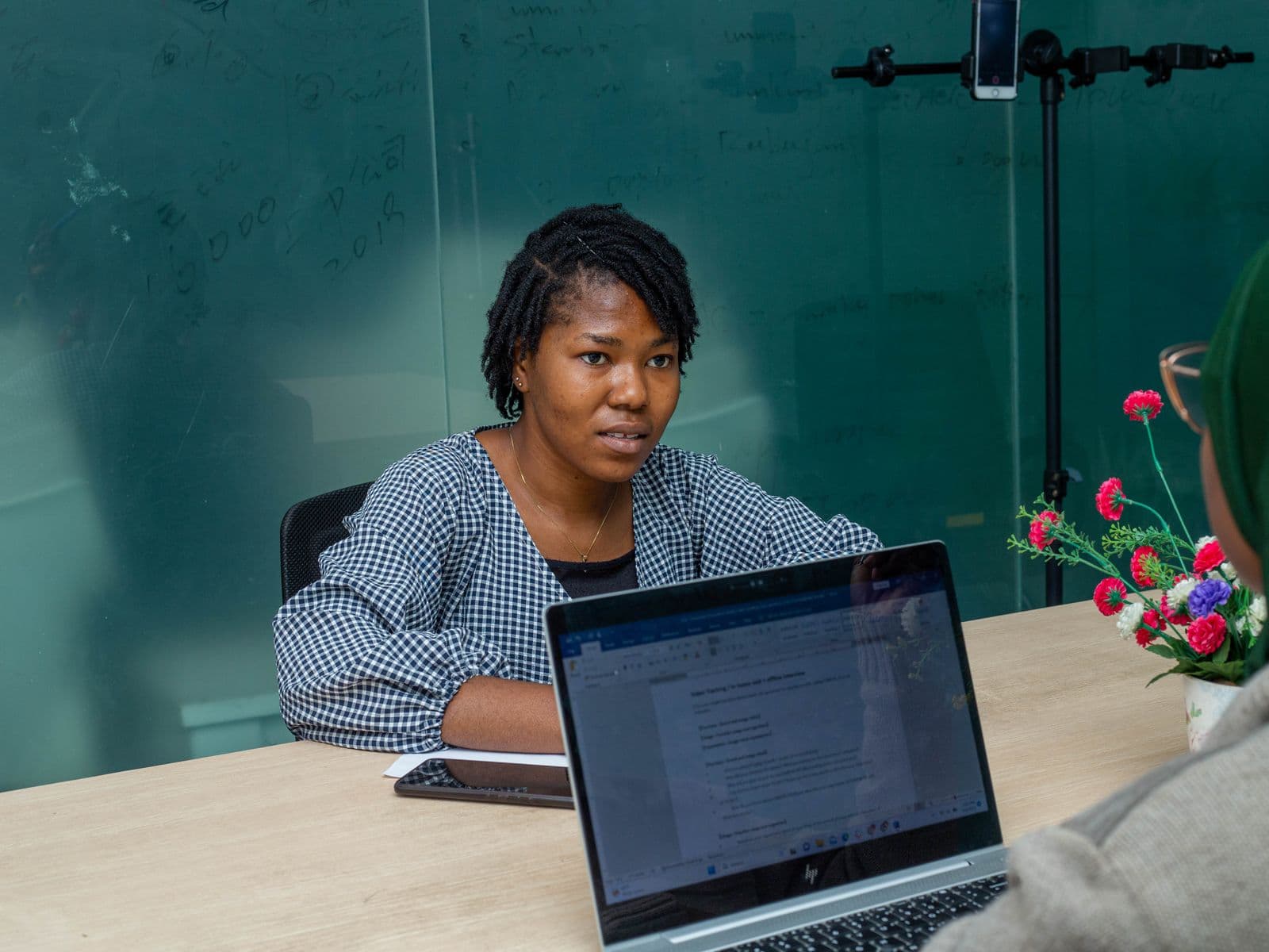 African marketing team collaborating during a meeting in a Lagos office