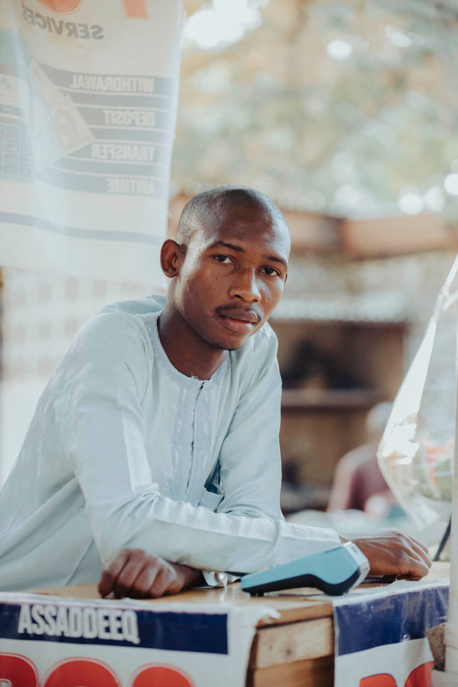 A small business owner in Africa working from his desk