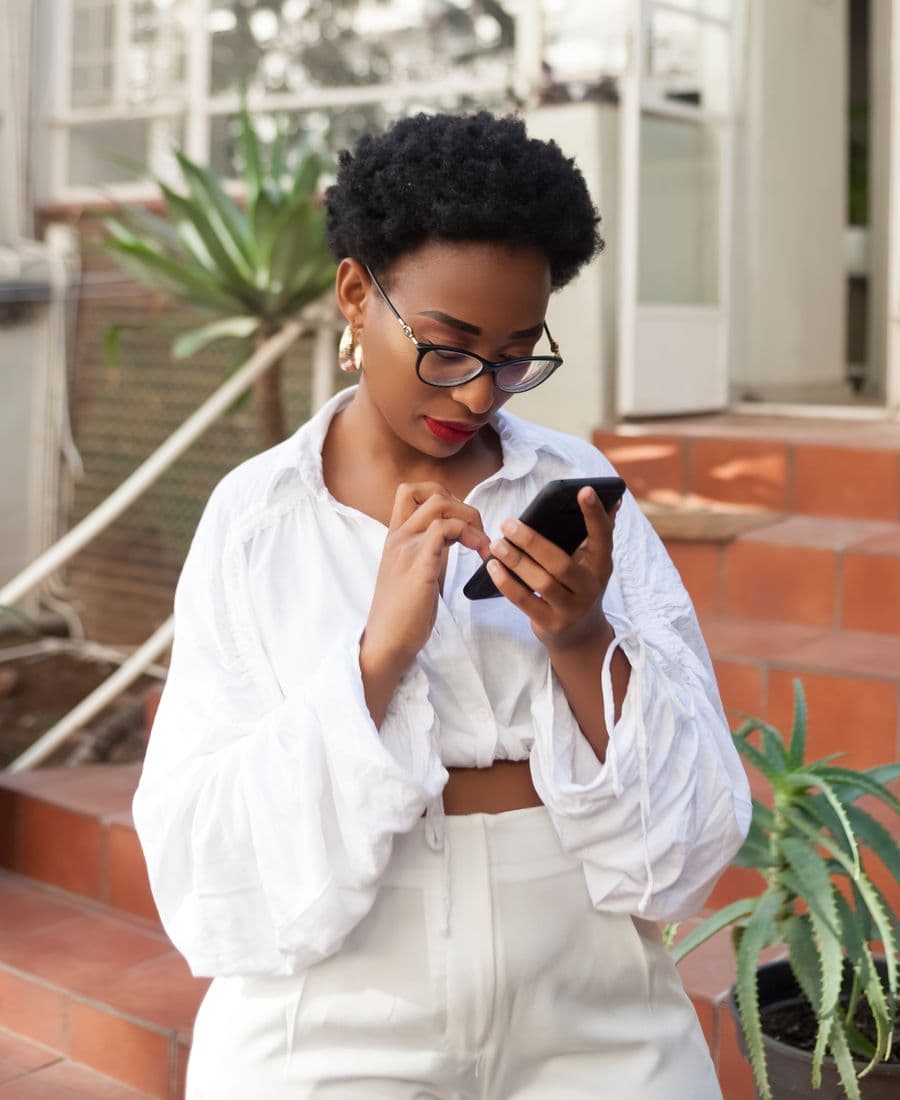 Woman using a smartphone to make a payment